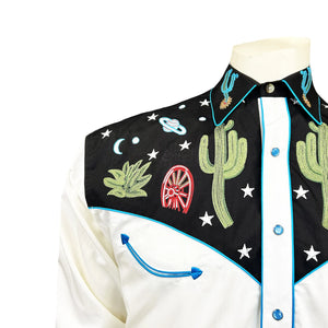 Ivory shirt with black embroidered collar and cuffs featuring cacti and stars. Front