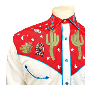 Ivory shirt with red embroidered collar and cuffs featuring cacti and stars. Front