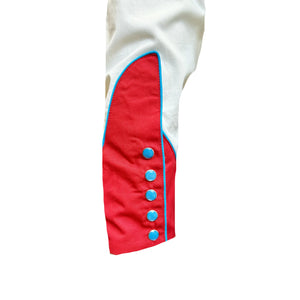 Ivory shirt with red embroidered collar and cuffs featuring cacti and stars. Front