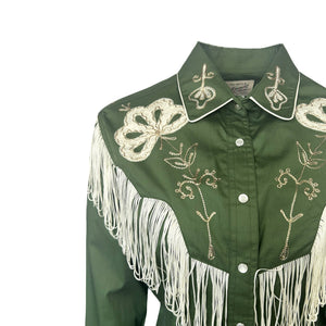 Green western-style embroidered shirt with white fringe. Front yoke.