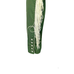 Green sleeve with white fringes and snaps.