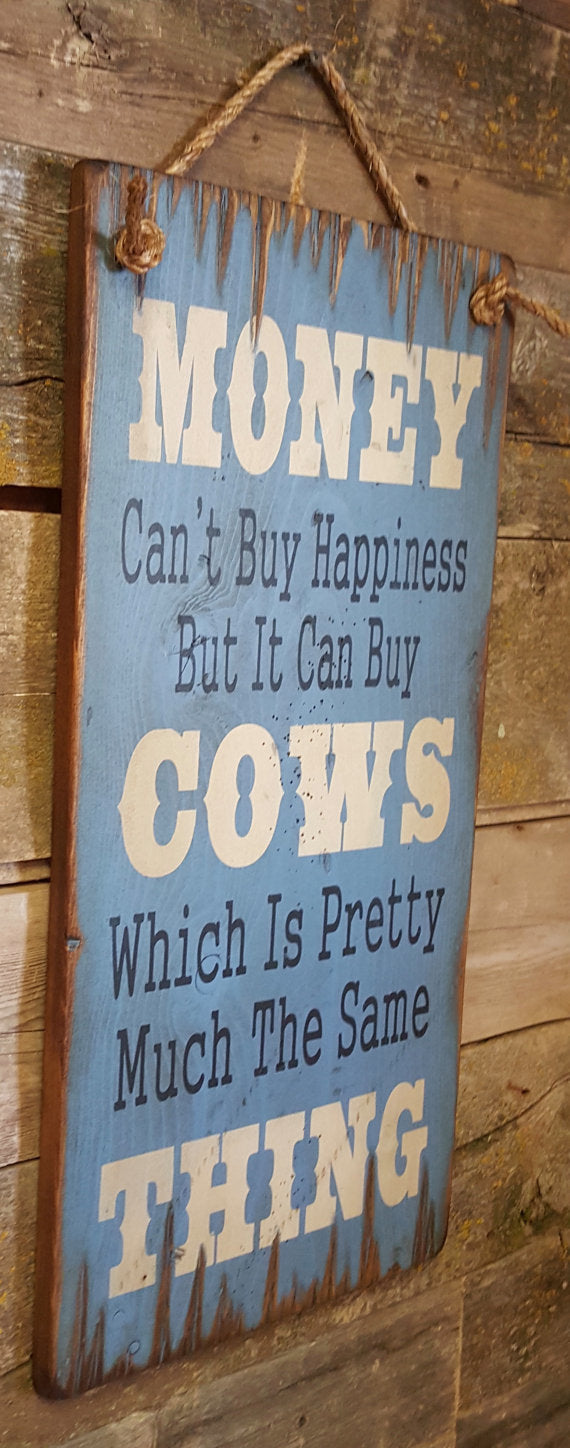 Western Wall Sign Money: Money Can't Buy Happiness But It Can Buy Cows Light Blue