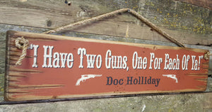 Western Wall Sign Movie Quote: I Have Two Guns, One For Each Of Ya! Left View