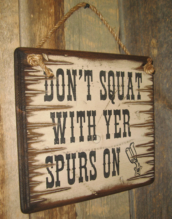 Western Wall Sign: Don't Squat With Your Spurs On Left Side