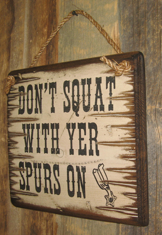 Western Wall Sign: Don't Squat With Your Spurs On Right Side