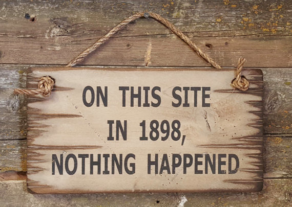 Western Wall Sign: On This Site in 1898, Nothing Happened