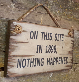 Western Wall Sign: On This Site in 1898, Nothing Happened Left Side