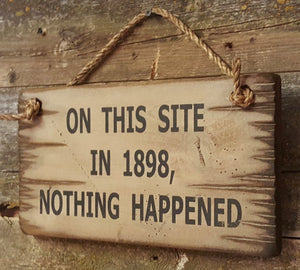 Western Wall Sign: On This Site in 1898, Nothing Happened Right Side