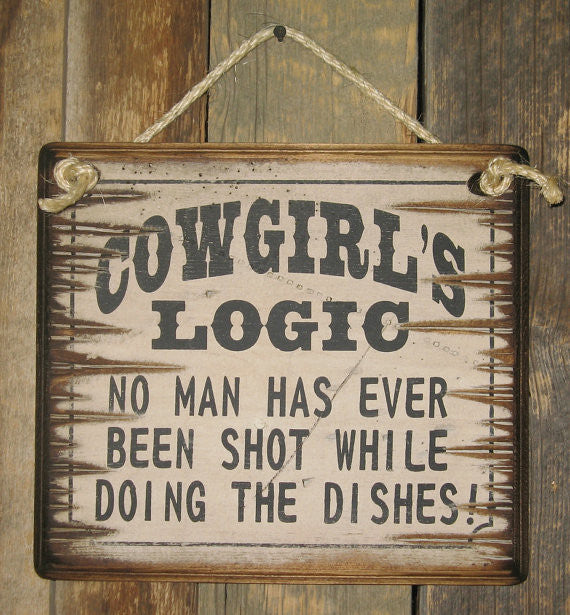 Western Wall Sign: Cowgirl's Logic No Man Has Ever Been Shot While Doing The Dishes!