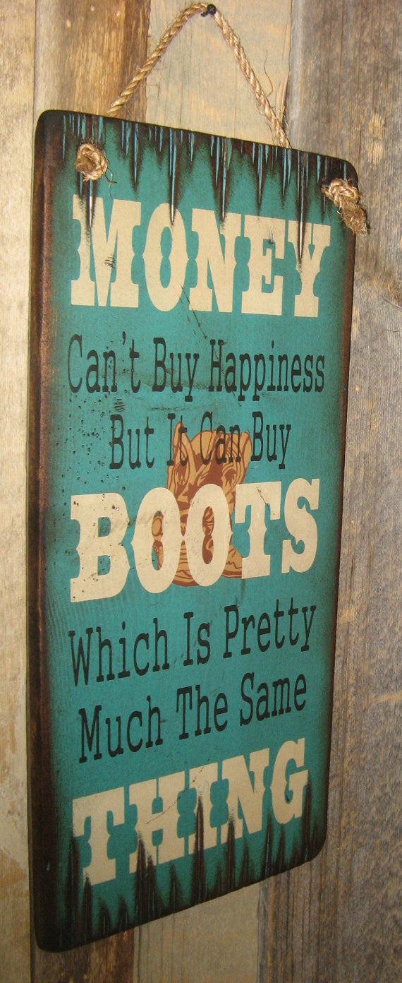 Western Wall Sign Money: Money Can't Buy Happiness But It Can Buy Boots Left View