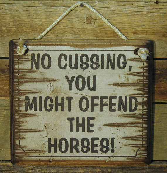 Western Wall Sign: No Cussing, You Might Offend The Horses! 